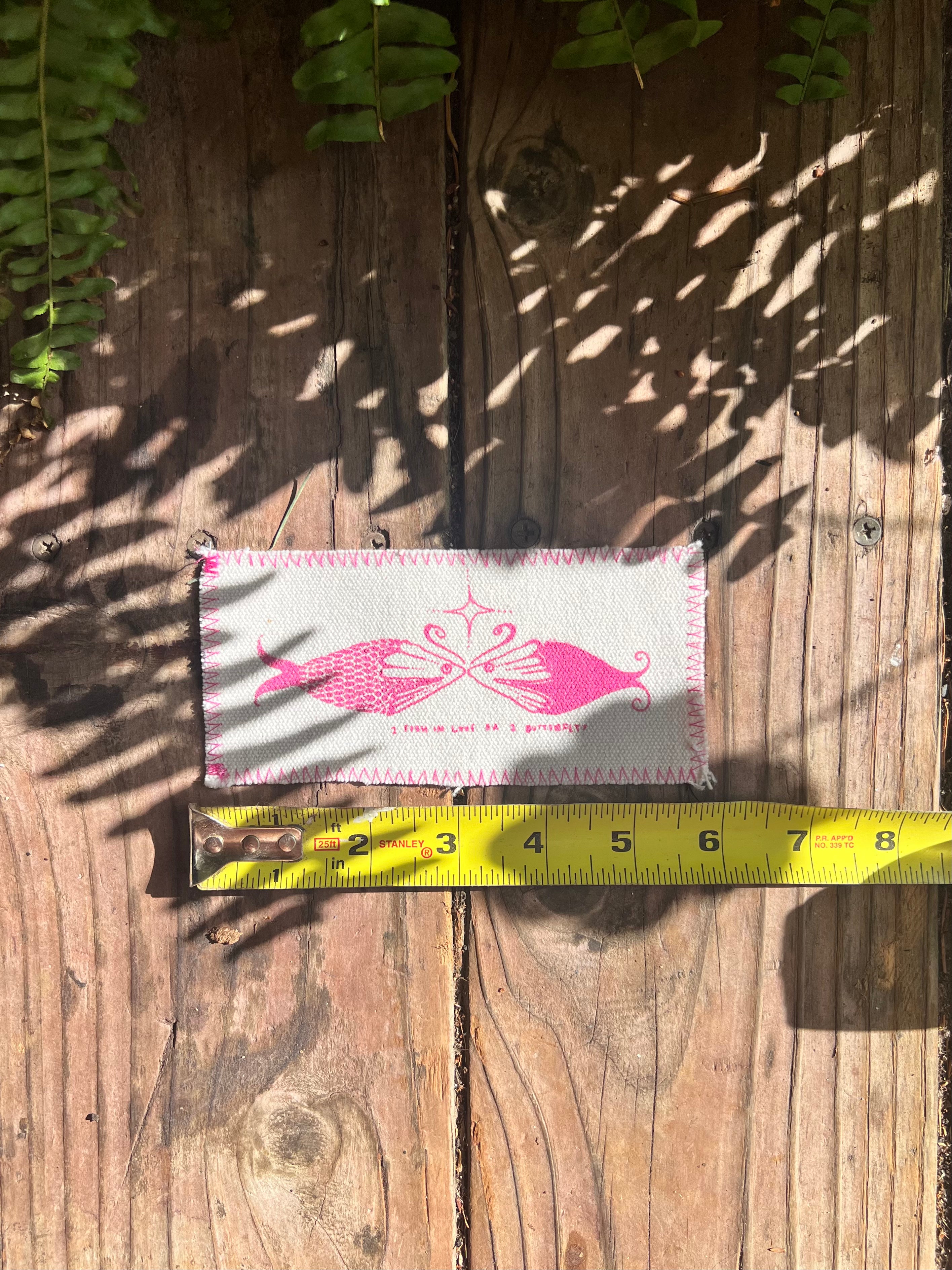 2 fish in love or 1 butterfly?